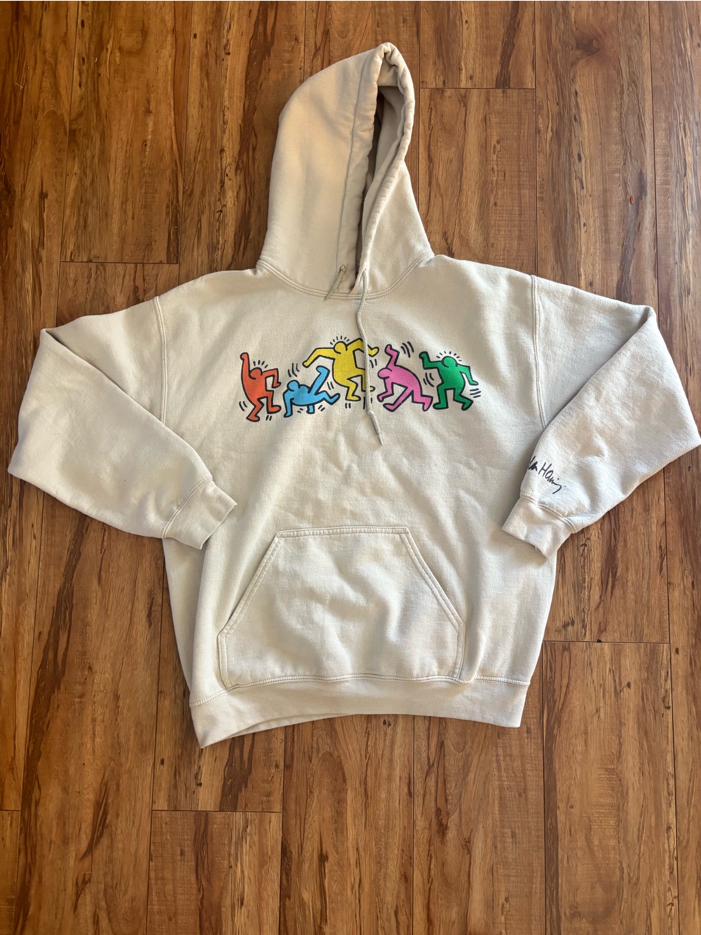 Cream Graphic Hoodie with Multicolor Dancing Figures